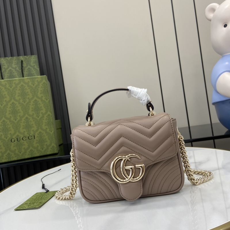 G*u*i top handle bags
